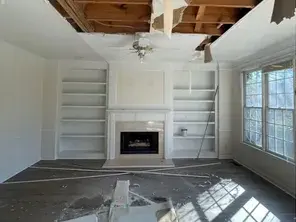 Before: frozen pipe burst above the kitchen ceiling (representative photo, not a specific customer project)